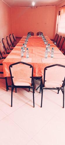 a large conference room with a long table with chairs at Cherika Hotel & Lodgings in Nakuru