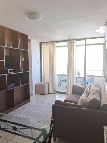 Χώρος καθιστικού στο Departamento 1 dormitorio