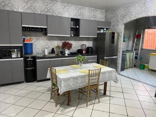 Kuchyň nebo kuchyňský kout v ubytování Casa Temporada COP30 Carlessa Rocha