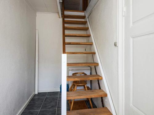 a staircase in a tiny house at 6 person holiday home in Bredebro in Bredebro