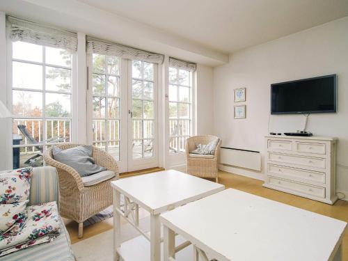 Μια τηλεόραση ή/και κέντρο ψυχαγωγίας στο 8 person holiday home in Nykøbing Sj