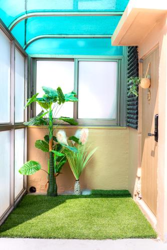Κήπος έξω από το Slowon Hostel 슬로우온 호스텔 홍대