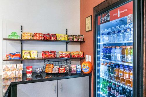 a refrigerator filled with lots of drinks in a store at Clarion Hotel BWI Airport Arundel Mills in Hanover
