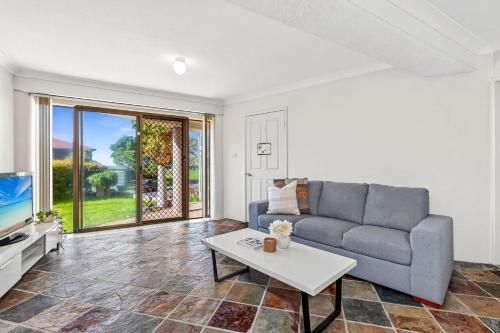 Μια τηλεόραση ή/και κέντρο ψυχαγωγίας στο Beachside Manor