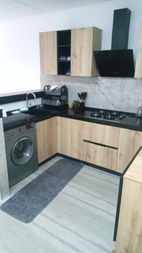 Kuchyň nebo kuchyňský kout v ubytování Appartement s1