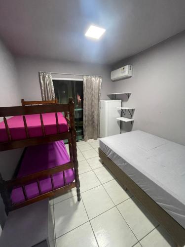 Postel nebo postele na pokoji v ubytování Pousada