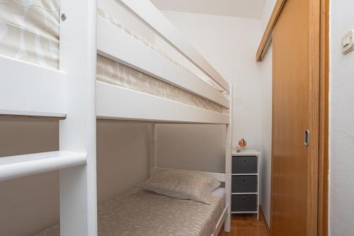 Ένα ή περισσότερα κρεβάτια σε δωμάτιο στο Dalma Residence apartman Girandella
