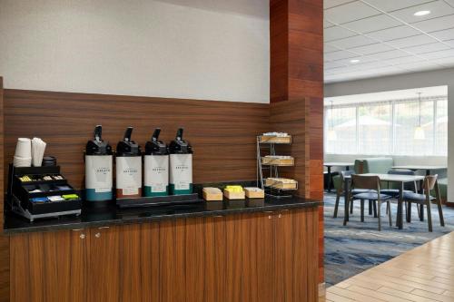 a bunch of bottles of wine on a counter at Fairfield Inn & Suites by Marriott Bristol in Bristol
