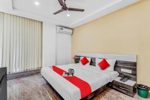 Ένα ή περισσότερα κρεβάτια σε δωμάτιο στο Hotel O Lavish Residency