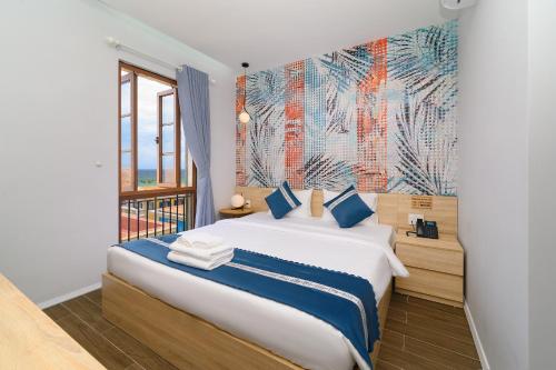 Ένα ή περισσότερα κρεβάτια σε δωμάτιο στο Golden Sunset Hotel