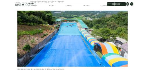 a large water slide at a water park at Venetian Terra KM LAND VTKL 하동 금오산 랜드 숲 캠핑장 