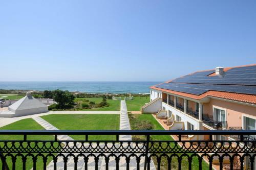 a view of a house with solar panels on the roof at Praia D'El Rey Marriott Golf & Beach Resort in Casal da Lagoa Seca