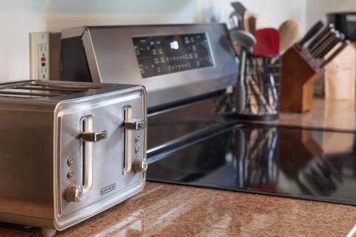 a toaster oven sitting on top of a kitchen counter at Metolius Cabin 5 in Camp Sherman