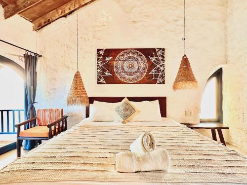 a bedroom with a large bed in a room at Flow House 3BR Beachfront An Bang Beach Hoi An by Beachside Boutique Homes in An Bàn (2)