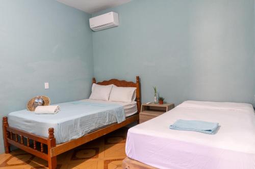 Posada del Centro Mazunte Rinconcitoにあるベッド
