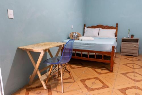 Posada del Centro Mazunte Rinconcitoにあるベッド