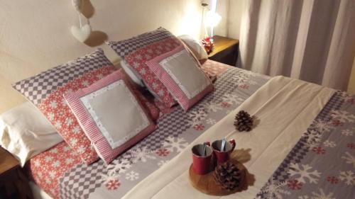 Postel nebo postele na pokoji v ubytování L'Arcouli