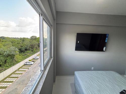 Μια τηλεόραση ή/και κέντρο ψυχαγωγίας στο Apartamento Amazônico Completo COP 30