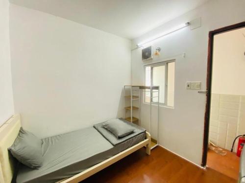 Postel nebo postele na pokoji v ubytování Lunaria Maison - Tan Dinh Corner