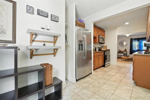 a kitchen with a stainless steel refrigerator at House in Arlington 5 Min to DC in Arlington
