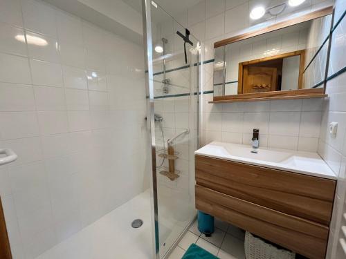 a bathroom with a sink and a shower at Appartement charmant et central à Samoëns, proche commerces et ski-bus - FR-1-624-54 in Samoëns