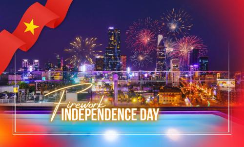 a view of a city with fireworks in the background at Winsuites Saigon Hotel in Ho Chi Minh City