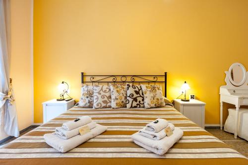Llit o llits en una habitació de Ila Guest House