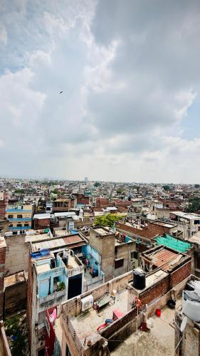 an aerial view of a city with buildings at Nahargarh view Hotel in Jaipur