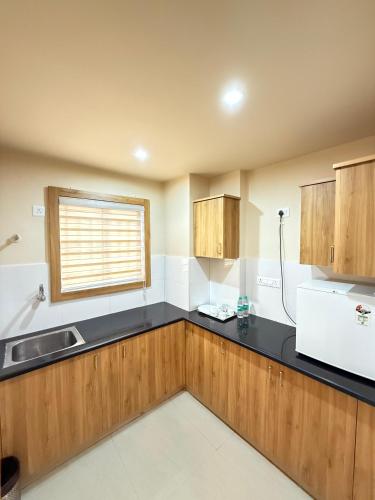 Köök või kööginurk majutusasutuses FLORA SUITES