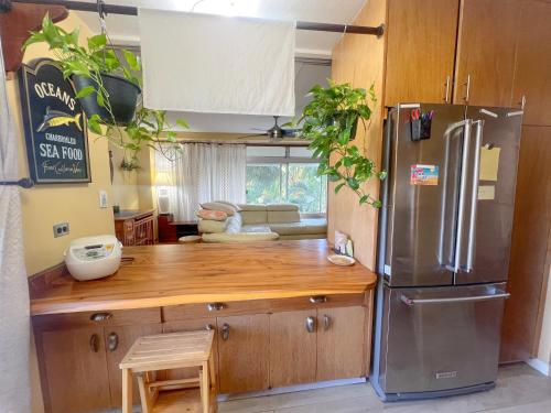 Photo de la galerie de l'établissement Tropical Garden Tranquility HNL condo, à Honolulu