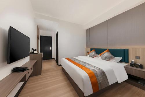 Katil atau katil-katil dalam bilik di Yue Sheng Hotel Guangzhou Railway St ation广州火车站