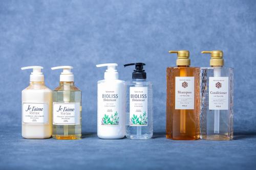 a group of four bottles of soap and liquids at Anshin Oyado Akihabara Denkigaiten in Tokyo