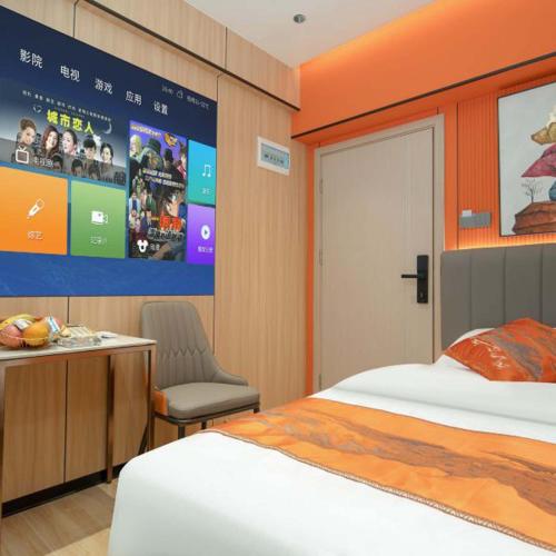 a hotel room with a bed and a tv at Chengxing Hotel Apartment (Wanyue City Plaza Branch) in Lung Wa