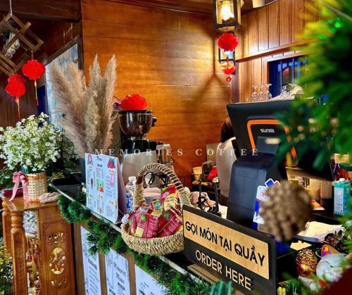 a store display with christmas items on a counter at Memories Hoi An Villa in Hoi An
