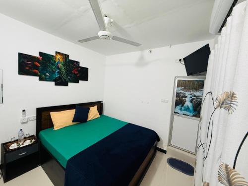 Postel nebo postele na pokoji v ubytování Batti Lagoon Hotel