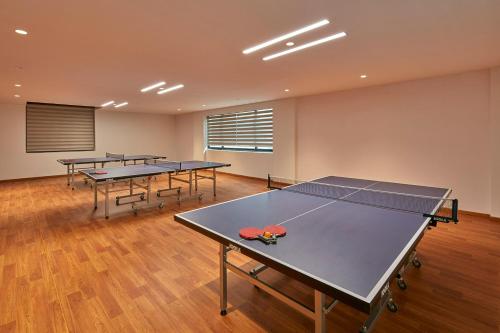 Stolní tenis v ubytování Signature Club Resort nebo okolí