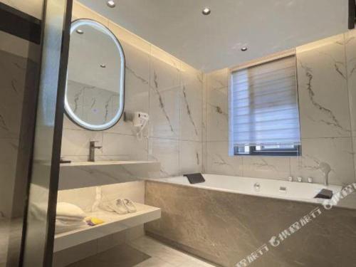 Ένα μπάνιο στο 7 Days Inn Deyang Zhongjiang Kuishan Park