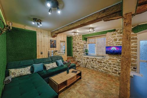 Μια τηλεόραση ή/και κέντρο ψυχαγωγίας στο Hide Hub Guest Apart