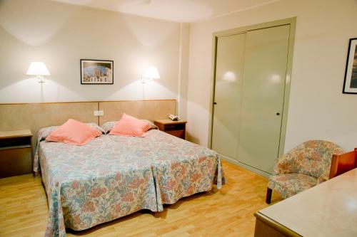 Cama o camas de una habitación en Hotel Balaguer