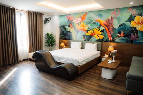 Postel nebo postele na pokoji v ubytování Minh Grand Ha Noi Hotel