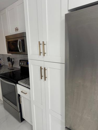 Η κουζίνα ή μικρή κουζίνα στο Lux Affordable Rooms