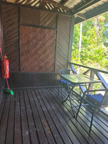 Un balcón o terraza de The Station Tioman