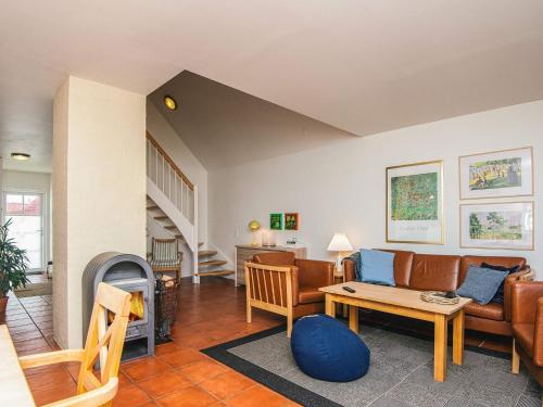 a living room with a couch and a table at Luxury Retreat in Blavand - By Traum Ferienwohnungen in Blåvand