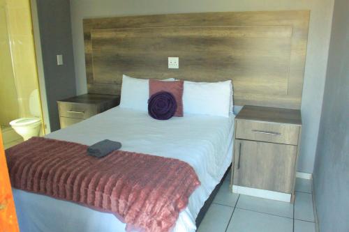 Ένα ή περισσότερα κρεβάτια σε δωμάτιο στο Blue Moon Guest House