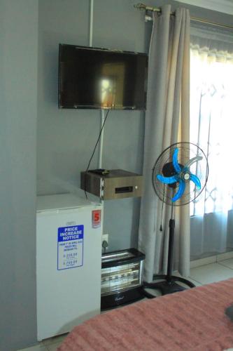 Η κουζίνα ή μικρή κουζίνα στο Blue Moon Guest House