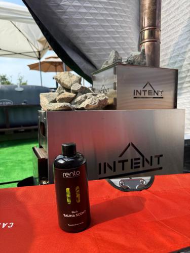 a bottle of inert sitting on a table next to a box at リゾートヴィラ宮島 Sunset terrace in Hatsukaichi