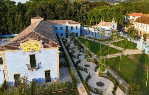 an aerial view of a house with a yard at Oca Grande Hotel Do Pezo in Melgaço