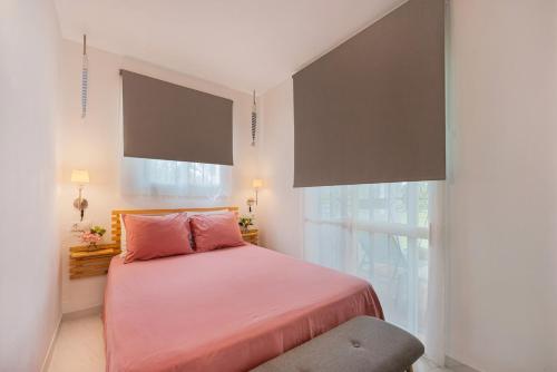 Postel nebo postele na pokoji v ubytování La casita de la playa