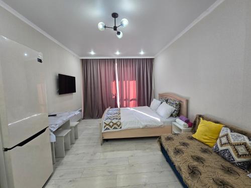 Postel nebo postele na pokoji v ubytování Евродвушка Аэропорт-жк Будапешт