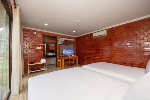 Katil atau katil-katil dalam bilik di Hese Ecolodge Phu Quoc